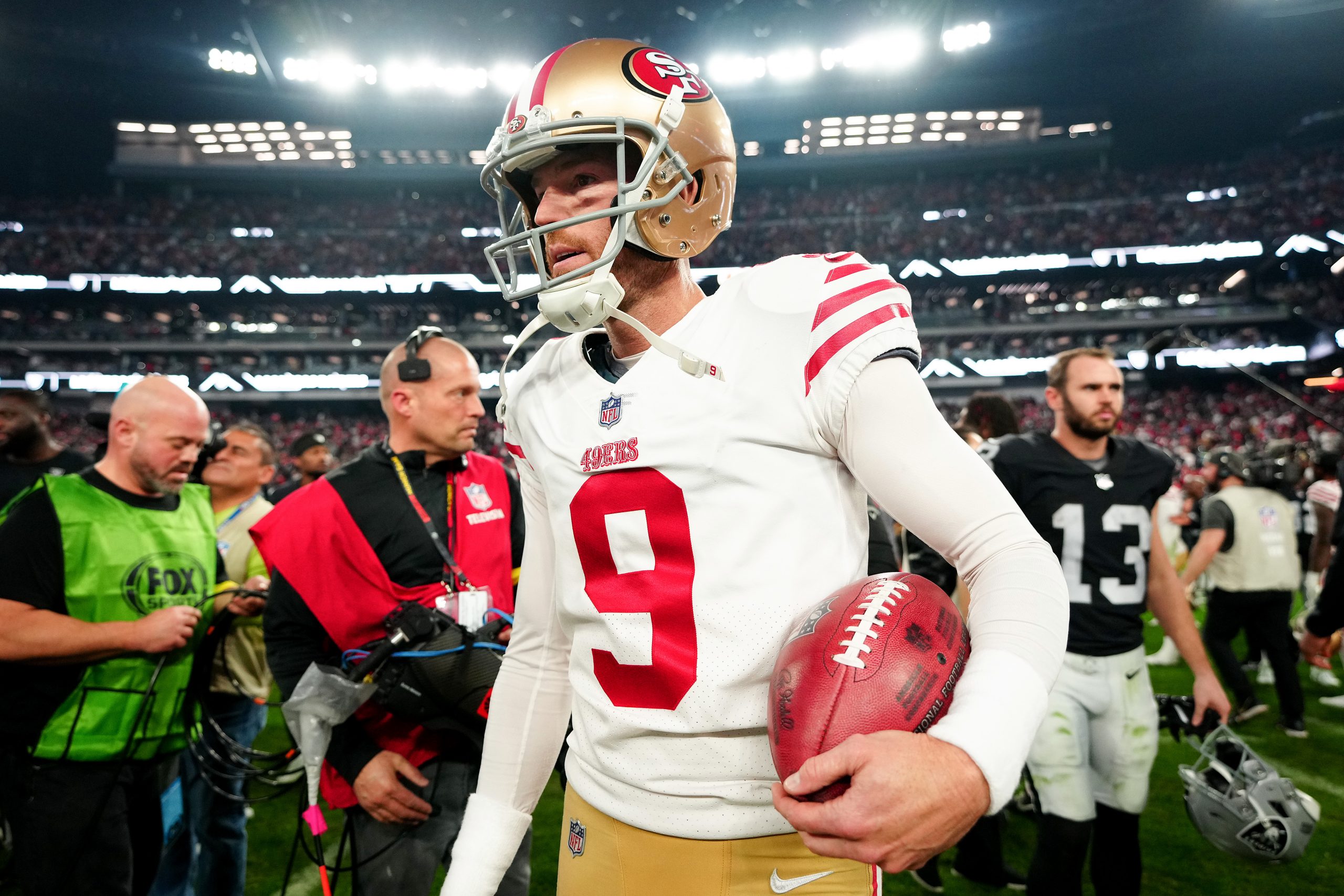 Robbie Gould #9 of the San Francisco 49ers celebrates an overtime win against the Las Vegas Raiders...