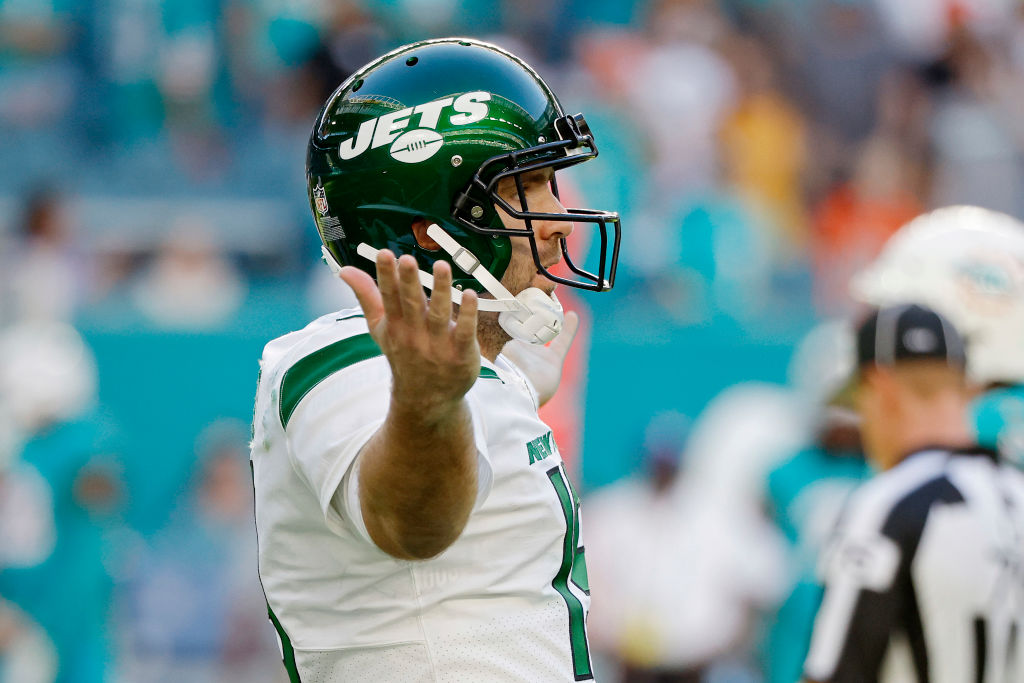 Joe Flacco #19 of the New York Jets reacts after a play during the fourth quarter against the Miami...