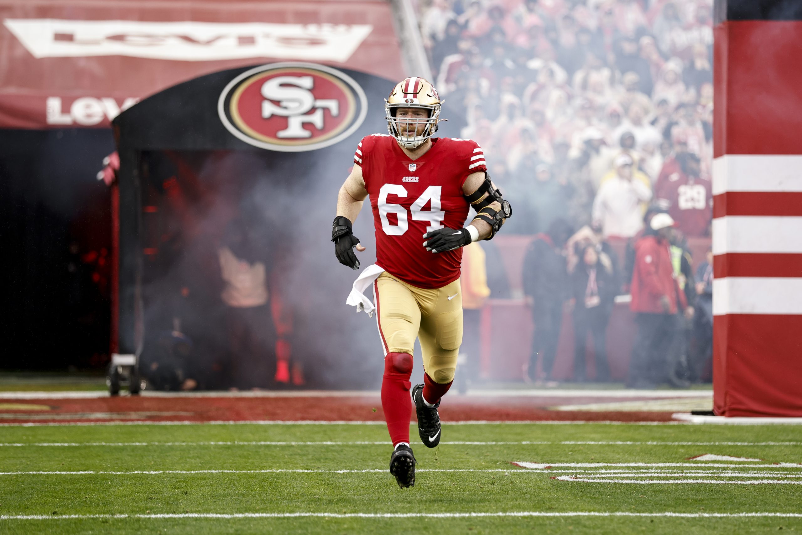 Jake Brendel #64 of the San Francisco 49ers takes the field prior to an NFL football game between t...