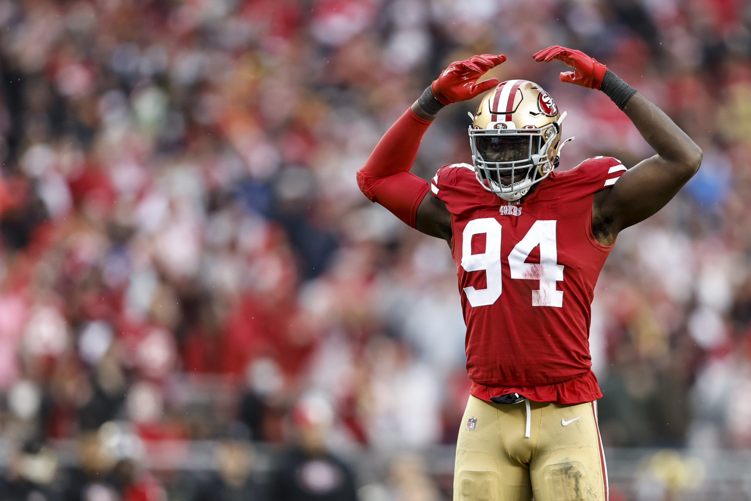 Charles Omenihu #94 of the San Francisco 49ers reacts during an NFL football game between the San F...