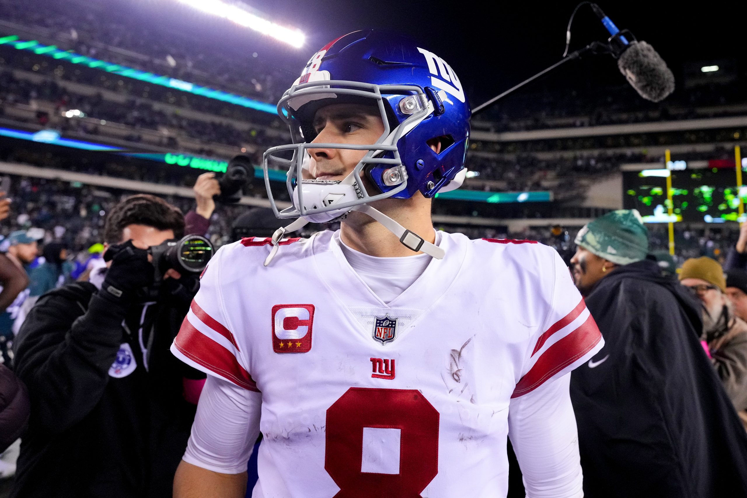 NFL Daniel Jones #8 of the New York Giants walks off the field after losing to the Philadelphia Eag...