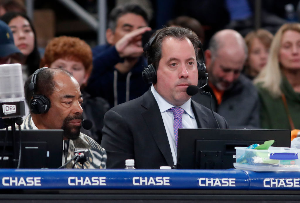 New York Knicks broadcasters Kenny Albert (R) and Walt Frazier work a game against the Dallas Maver...