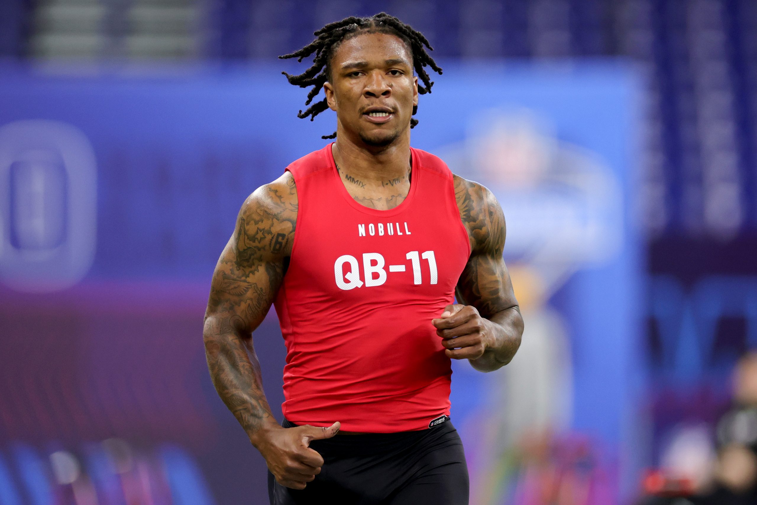 Quarterback Anthony Richardson of Florida participates in the 40-yard dash during the NFL Combine a...