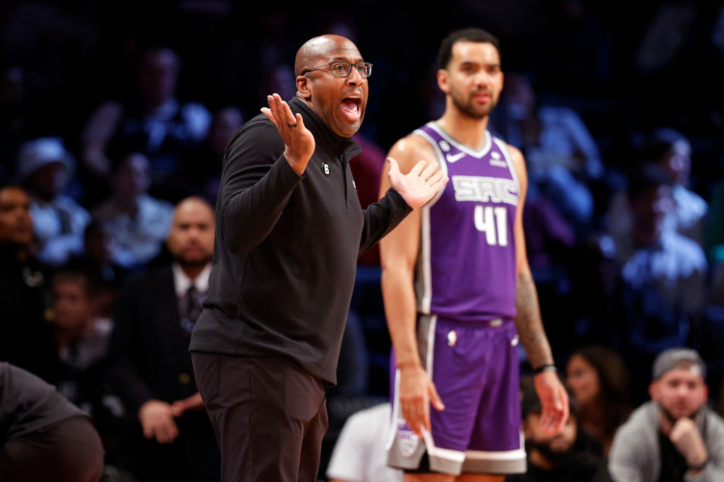 Head coach Mike Brown of the Sacramento Kings reacts during the first half against the Brooklyn Net...