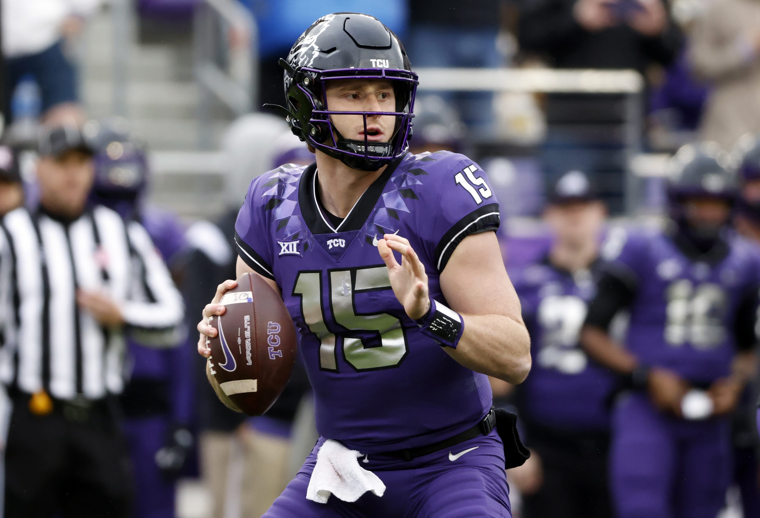 49ers; Quarterback Max Duggan #15 of the TCU Horned Frogs looks to throw against the Iowa State Cyc...
