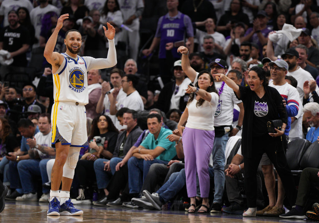 Stephen Curry #30 of the Golden State Warriors reacts to a call during the fourth quarter of the ga...
