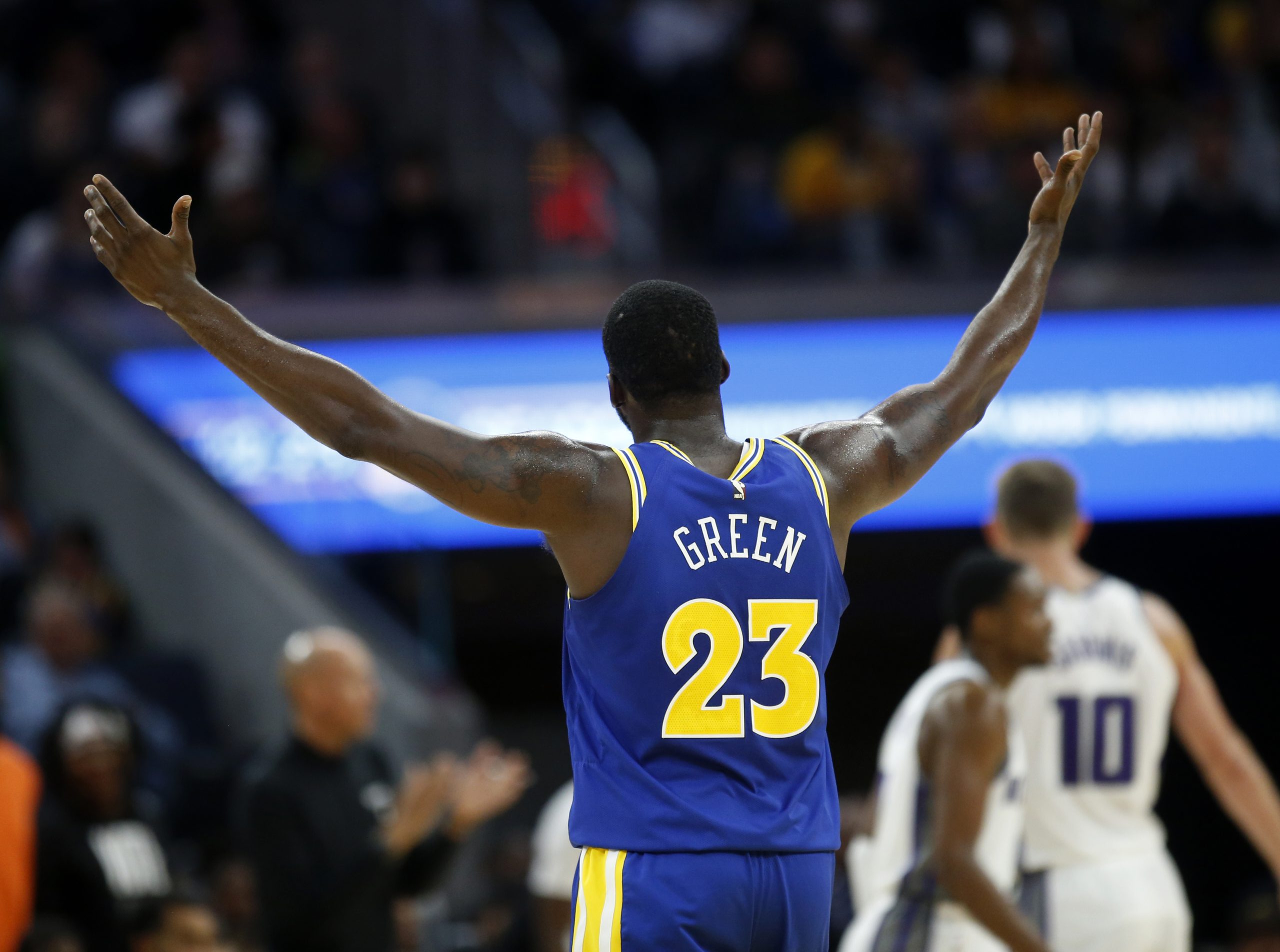Draymond Green #23 reacts in the second quarter of their NBA game against the Sacramento Kings at t...