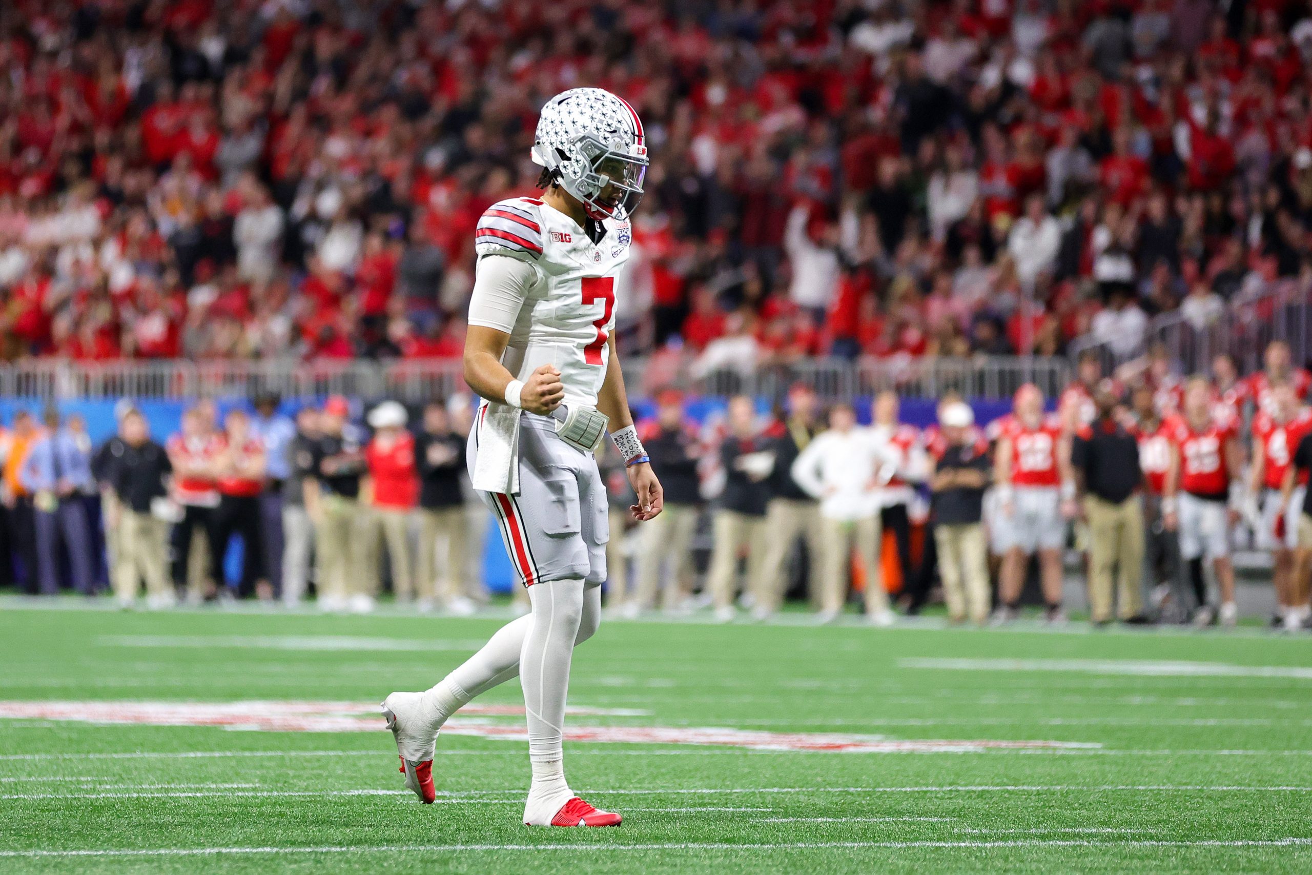 C.J. Stroud #7 of the Ohio State Buckeyes reacts after a touchdown during the second quarter agains...