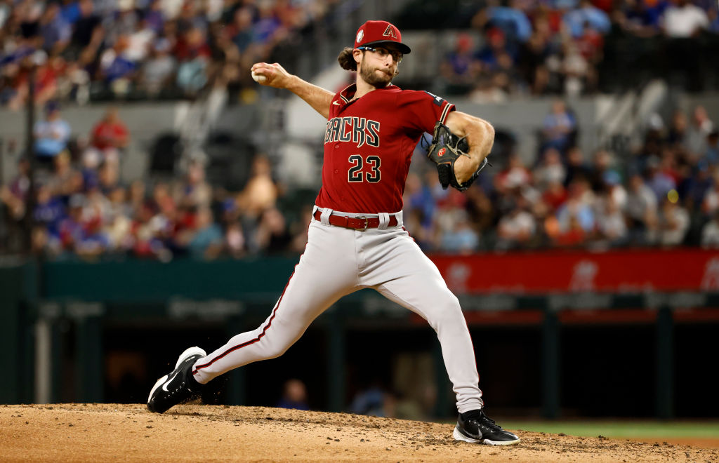 Zac Gallen #23 of the Arizona Diamondbacks pitches against the Texas Rangers during the fifth innin...