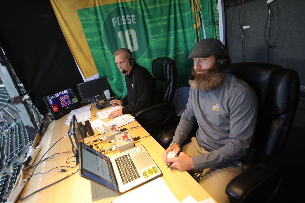 Broadcasters Glen Kuiper and Dallas Braden of the Oakland A's in the TV booth during the game again...