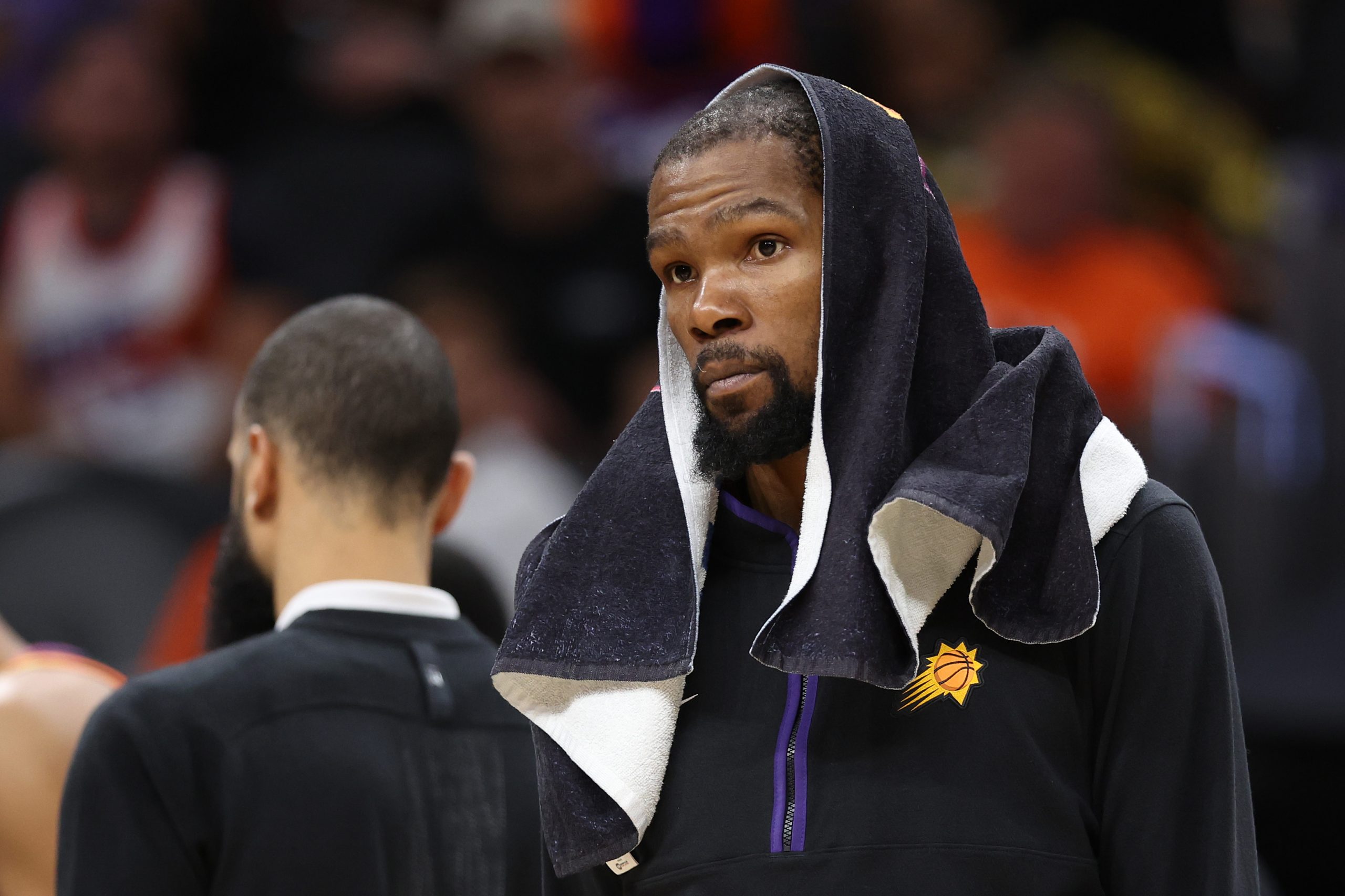 Kevin Durant #35 of the Phoenix Suns reacts during the fourth quarter against the Denver Nuggets in...