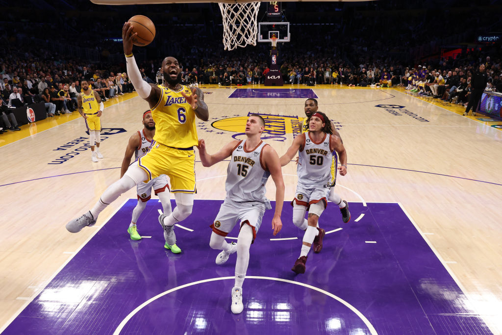 LOS ANGELES, CALIFORNIA - MAY 22: LeBron James #6 of the Los Angeles Lakers scores on a layup in fr...
