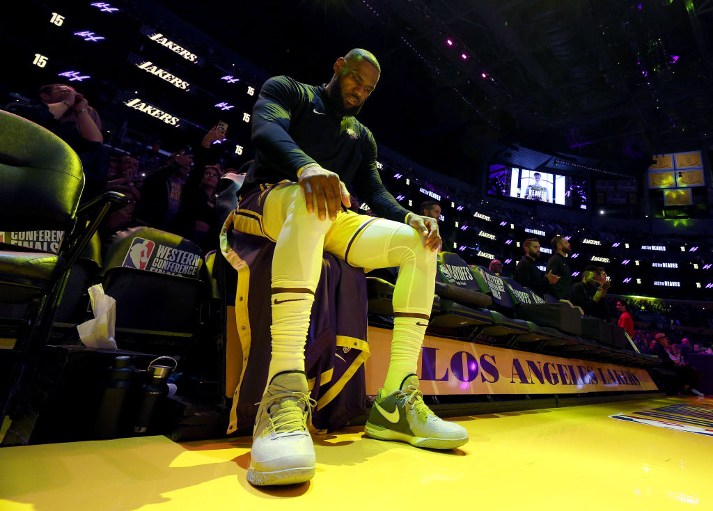 LOS ANGELES, CALIFORNIA - MAY 22: LeBron James #6 of the Los Angeles Lakers sits on the bench prior...