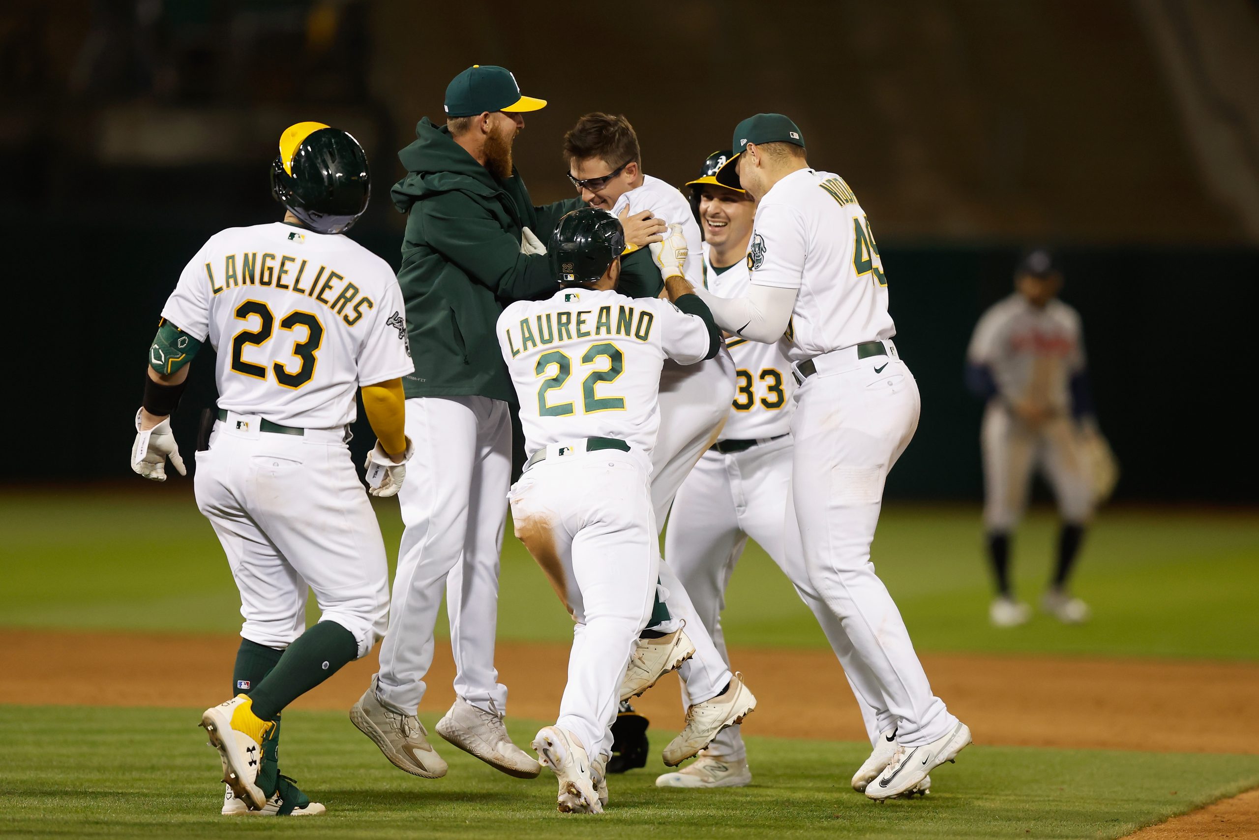 OAKLAND, CALIFORNIA - MAY 30: Jonah Bride #26 of the Oakland Athletics celebrates with teammates af...
