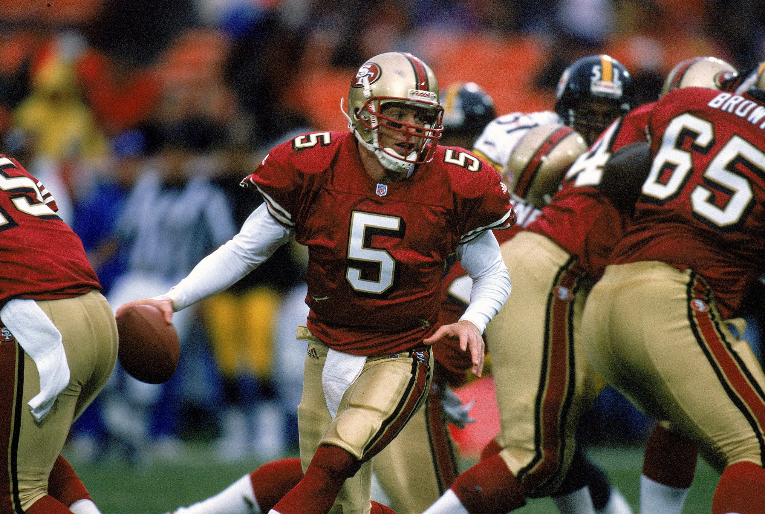 7 Nov 1999: Jeff Garcia #5 of the San Francisco 49ers grips the ball during the game against the Pi...