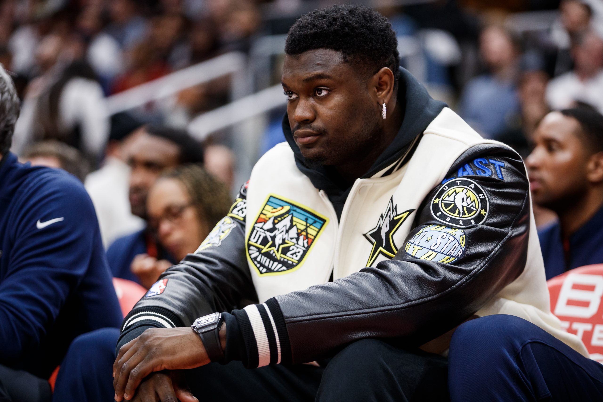 Zion Williamson #1 of the New Orleans Pelicans sits on the bench during the second half of their NB...