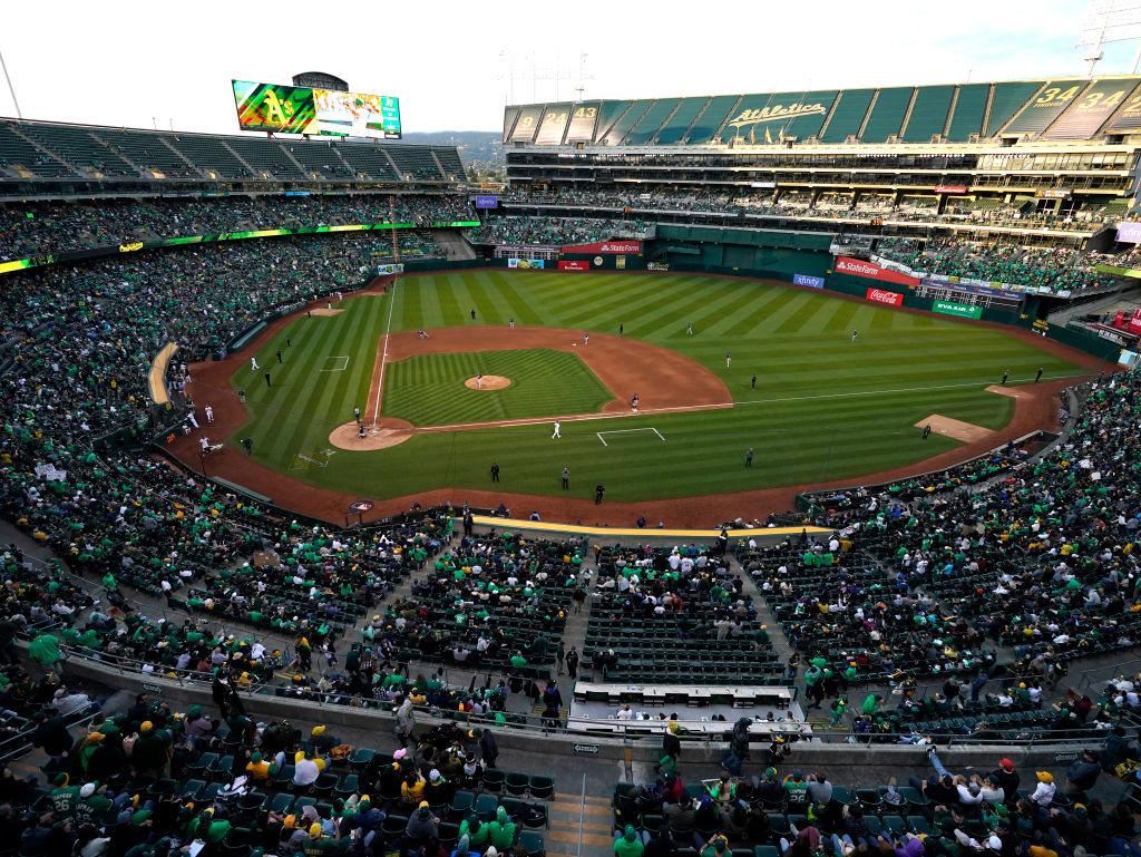 OAKLAND, CALIFORNIA - JUNE 13: Oakland Athletics fans fill RingCentral Coliseum during a reverse bo...