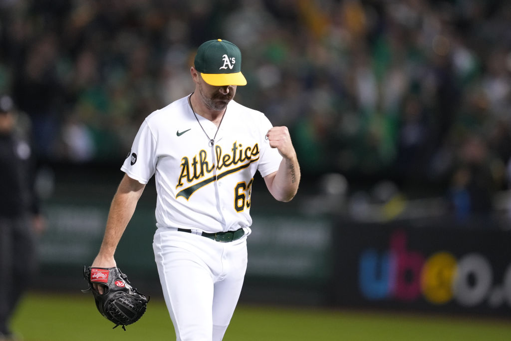 Hogan Harris #63 of the Oakland Athletics pitches in the ninth inning at RingCentral Coliseum on Ju...