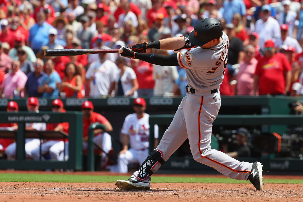 Mike Yastrzemski #5 of the San Francisco Giants hits a game-tying two-run home run against the St. ...