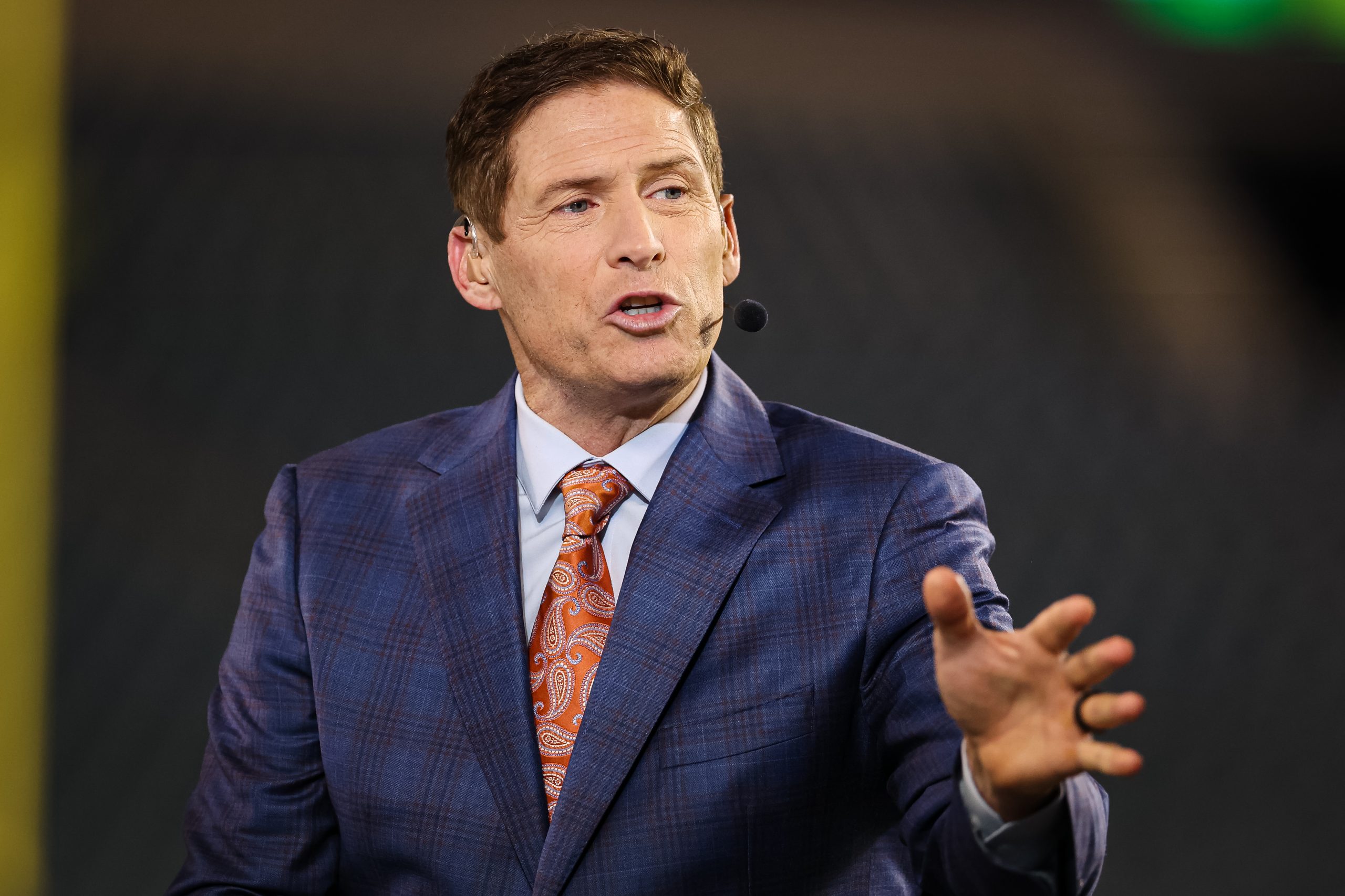 Former NFL player and current NFL analyst Steve Young interacts before the game between the Philade...