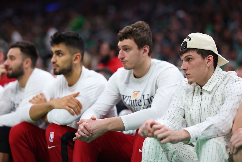 Tyler Herro #14 of the Miami Heat sits on the bench in game five of the Eastern Conference Finals a...