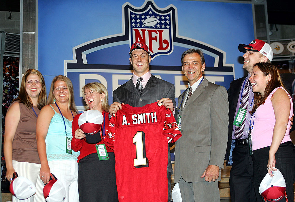 Quarterback Alex Smith (C) (Utah), who was drafted first overall by the San Francisco 49ers, poses ...