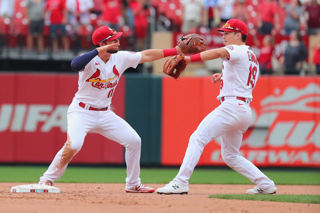 ST LOUIS, MO - SEPTEMBER 30: Paul DeJong #11 of the St. Louis Cardinals and Tommy Edman #19 of the ...