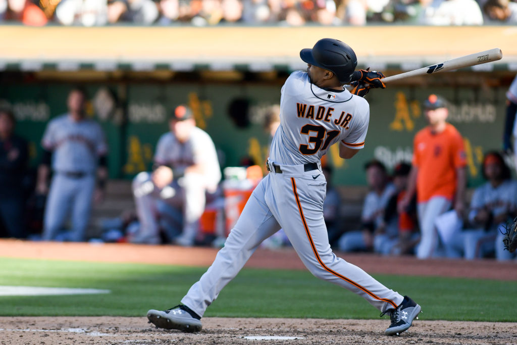 OAKLAND, CA - AUGUST 06: LaMonte Wade Jr. #31 of the San Francisco Giants hits a home run in the si...