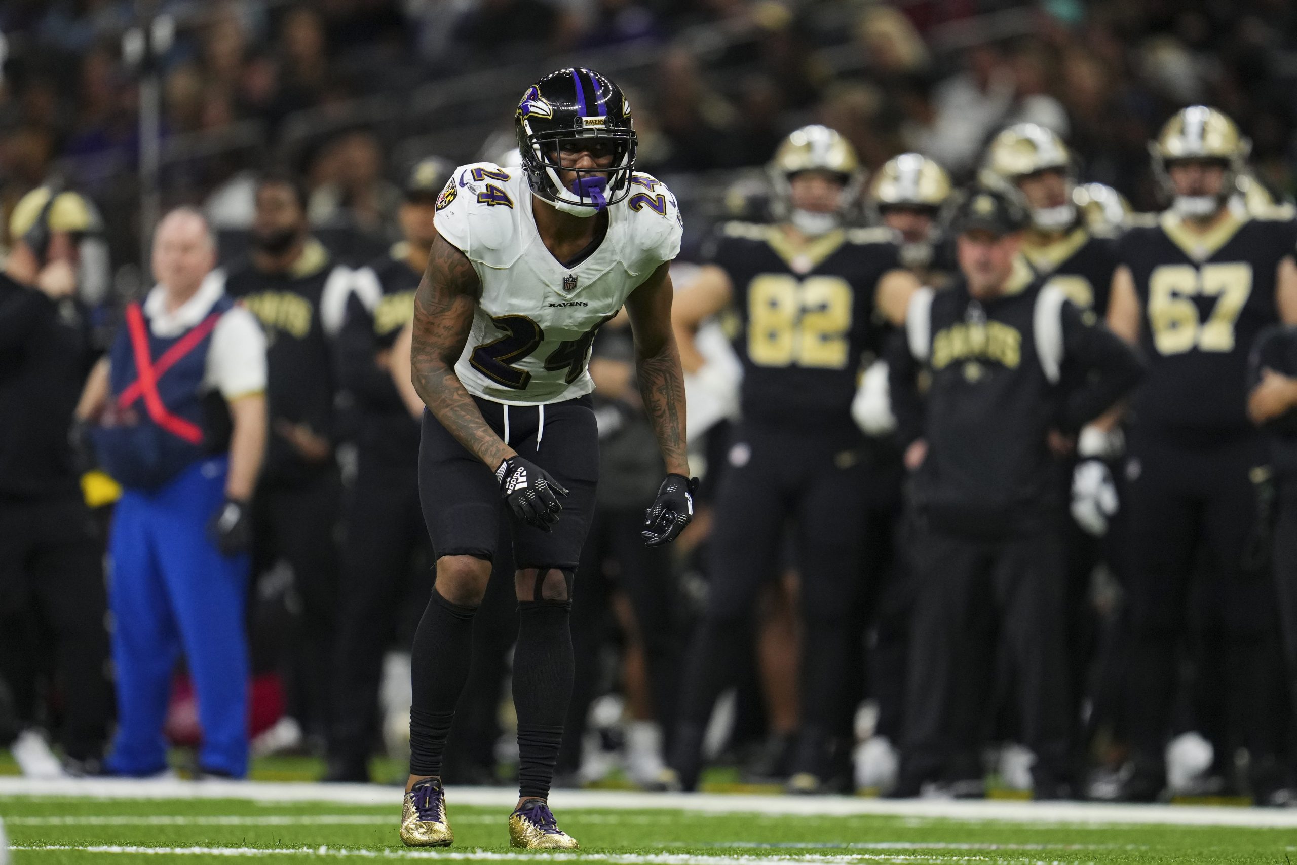 Marcus Peters #24 of the Baltimore Ravens defends against the New Orleans Saints at Caesars Superdo...