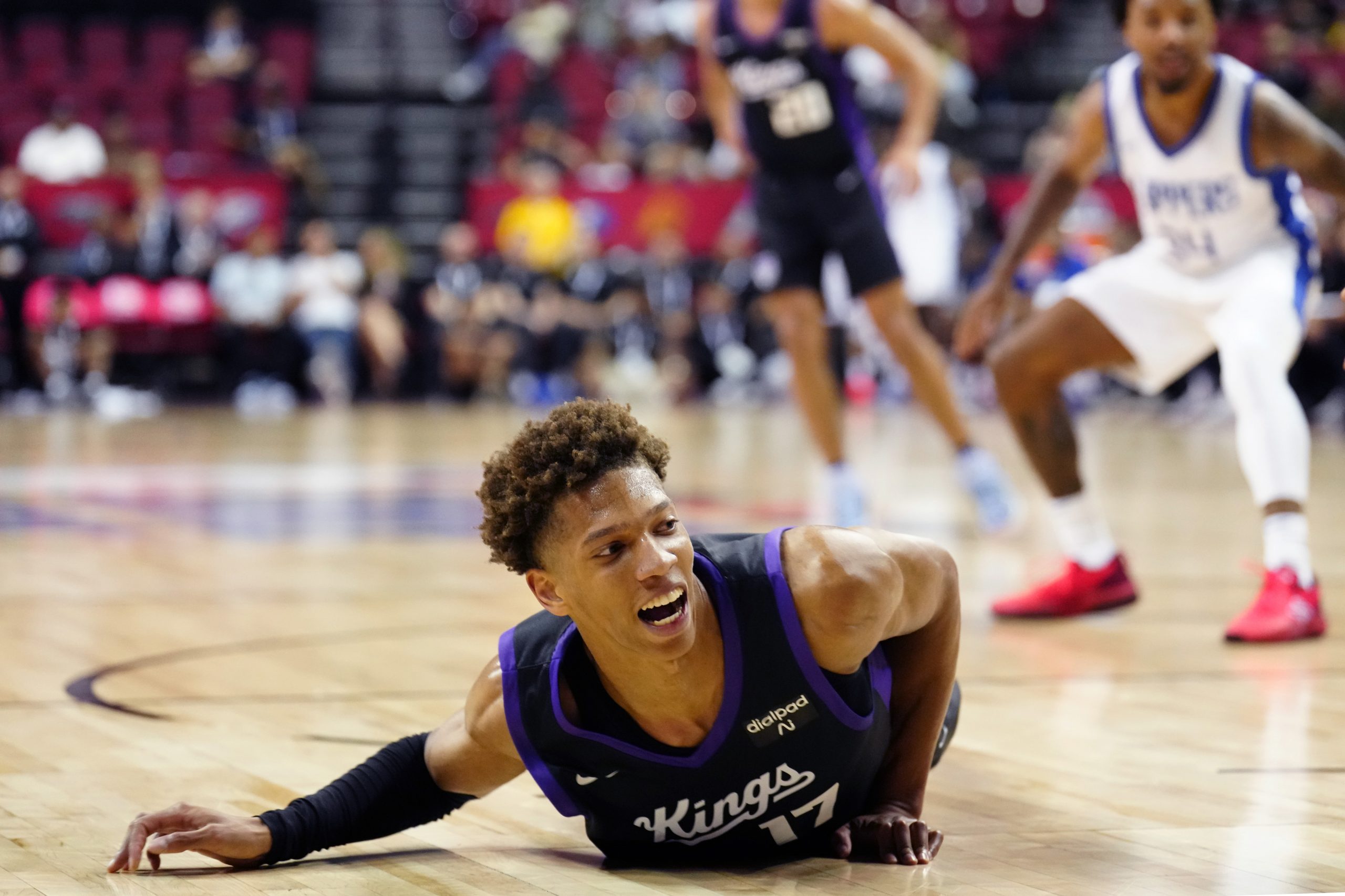 Kessler Edwards slides after being fouled in the second half of a 2023 NBA Summer League game again...