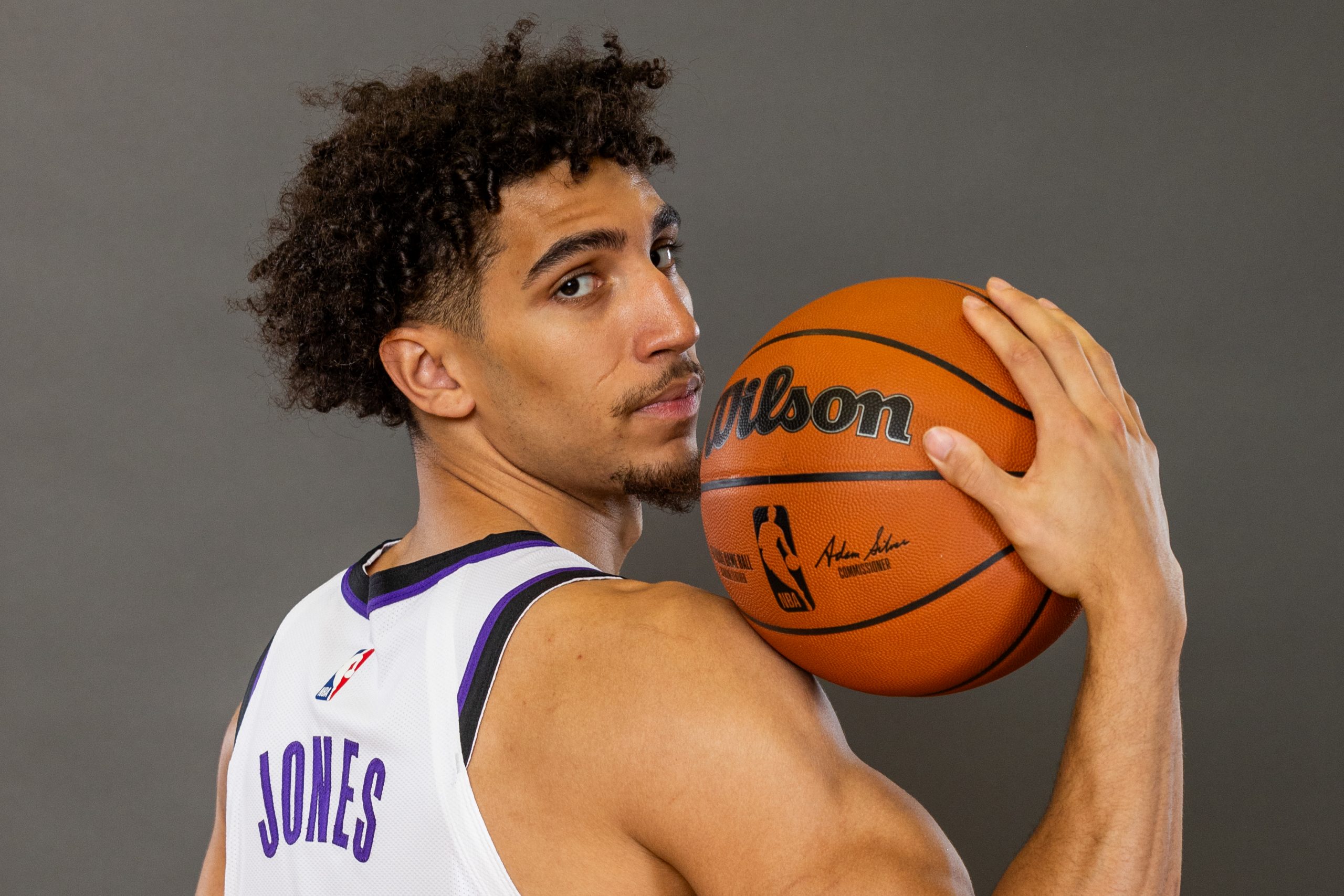Colby Jones #20 of the Sacramento Kings poses for a portrait during the 2023 NBA rookie photo shoot...