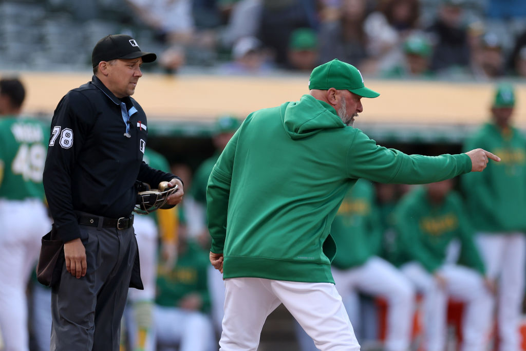 Oakland A's manager Mark Kotsay argues with home plate umpire Adam Hamari #78 after Hamari called T...