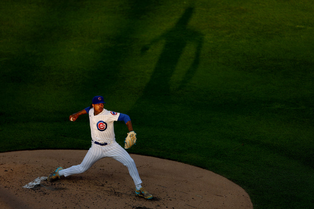 CHICAGO, ILLINOIS - JULY 20: Marcus Stroman #0 of the Chicago Cubs delivers a pitch during the seco...
