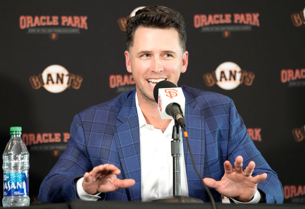 Buster Posey #28 of the San Francisco Giants speaks at a press conference announcing his retirement...