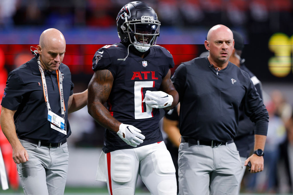 Damien Williams #6 of the Atlanta Falcons leaves the game after an injury during the first quarter ...