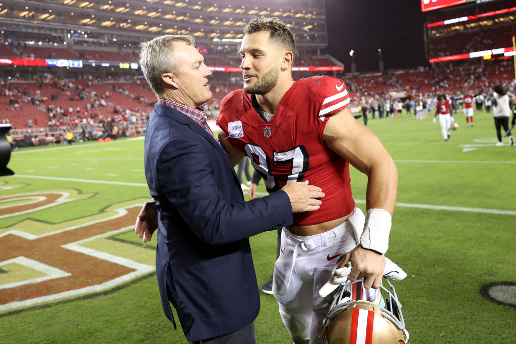 San Francisco 49ers general manager John Lynch congratulates Nick Bosa #97 after they beat the Los ...