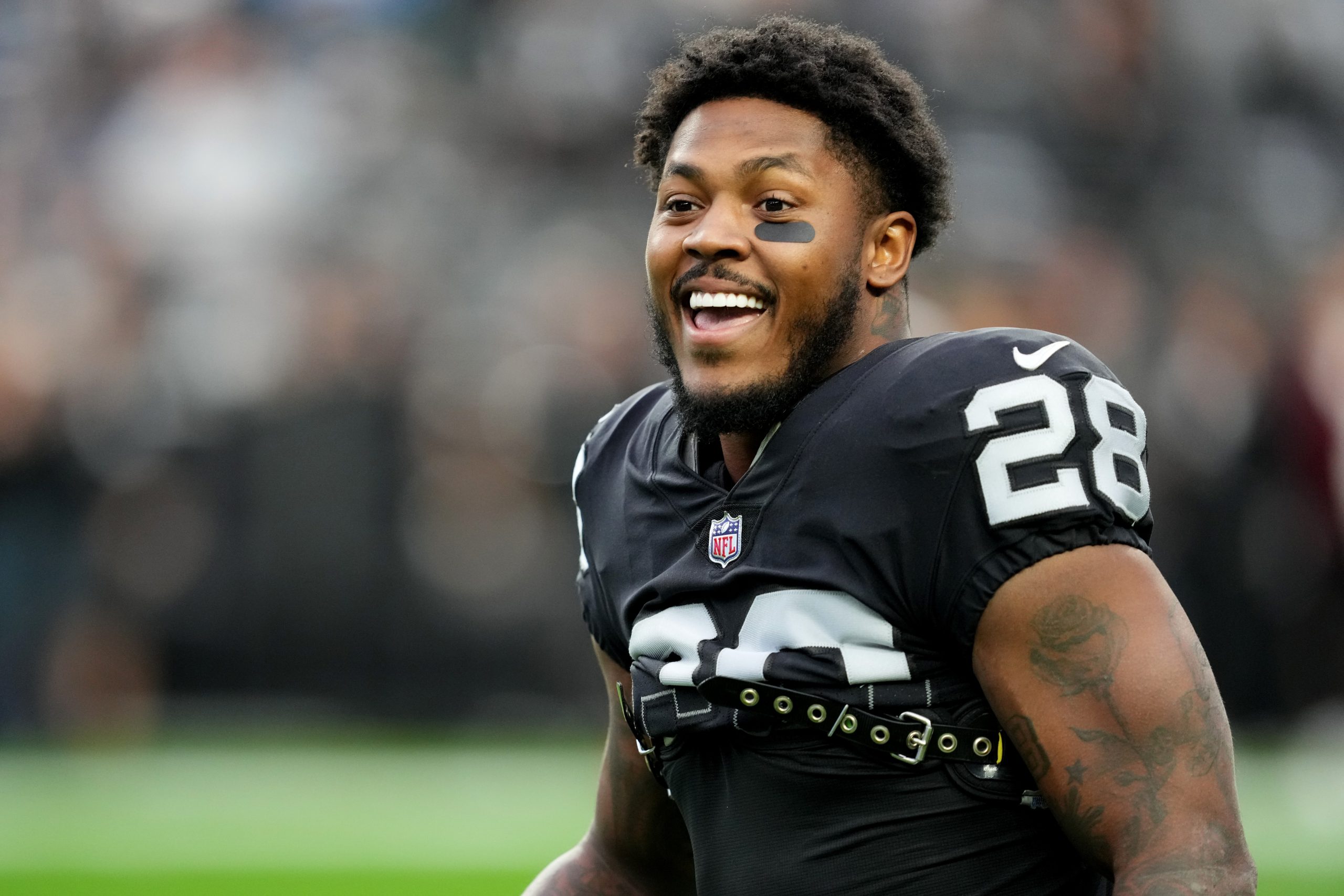 Josh Jacobs #28 of the Las Vegas Raiders warms up prior to a game against the Los Angeles Chargers ...