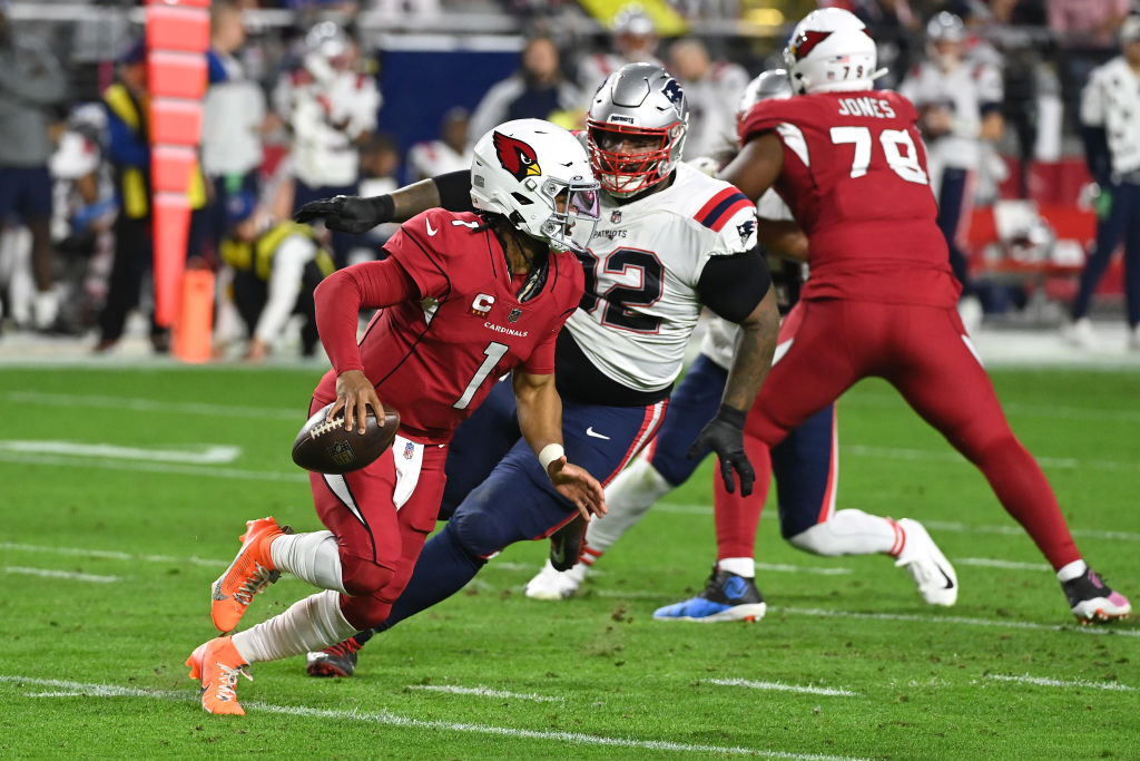Kyler Murray #1 of the Arizona Cardinals scrambles with the ball against the New England Patriots d...