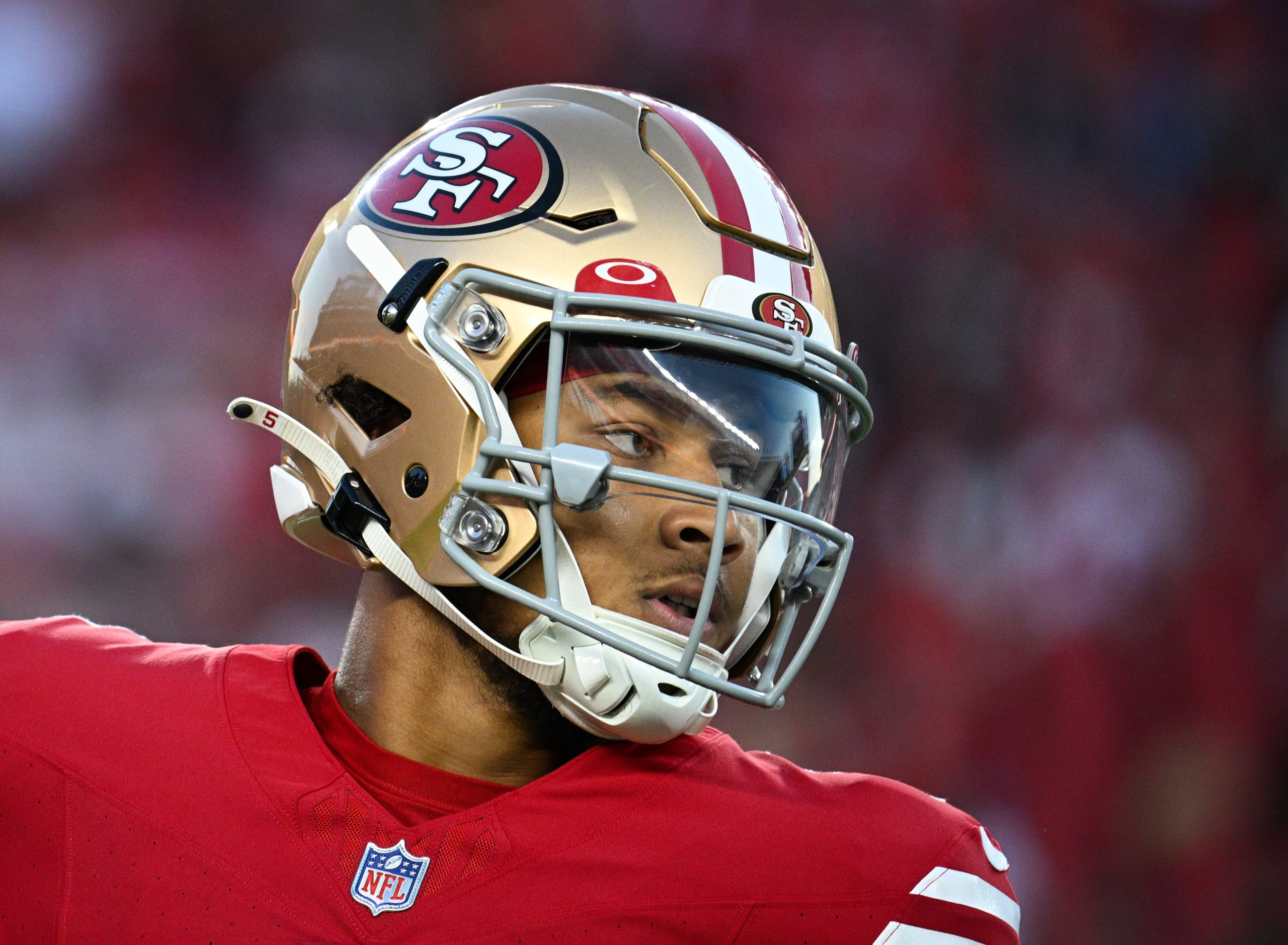 Trey Lance #5 of the San Francisco 49ers looks on during the second half of a preseason game agains...