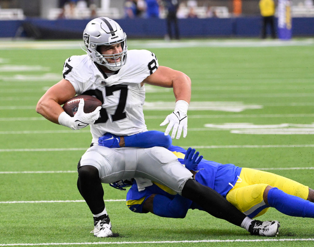 Tight end Michael Mayer #87 of the Las Vegas Raiders catches a pass for first down against the Los ...