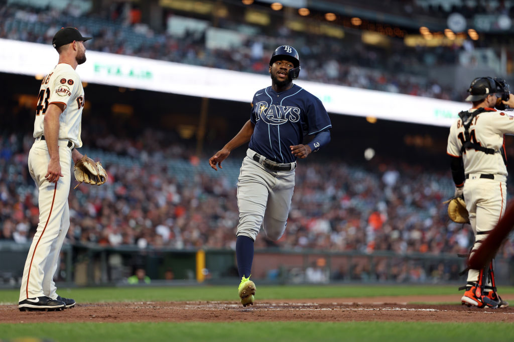 SAN FRANCISCO, CALIFORNIA - AUGUST 14: Osleivis Basabe #37 of the Tampa Bay Rays runs home to score...