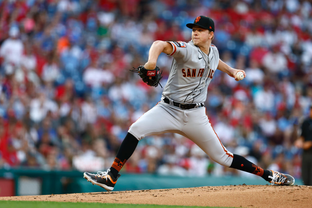 Pitcher Kyle Harrison #45 of the San Francisco Giants delivers a pitch in his Major League debut ag...