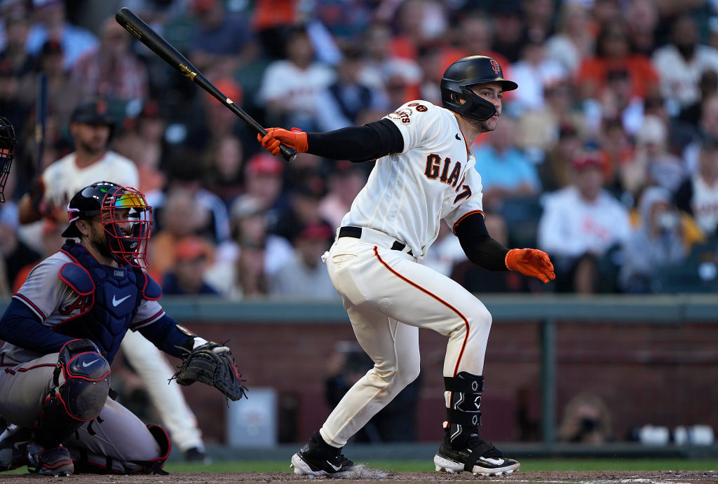 Patrick Bailey #14 of the San Francisco Giants hits a bases loaded three-run RBI double against the...