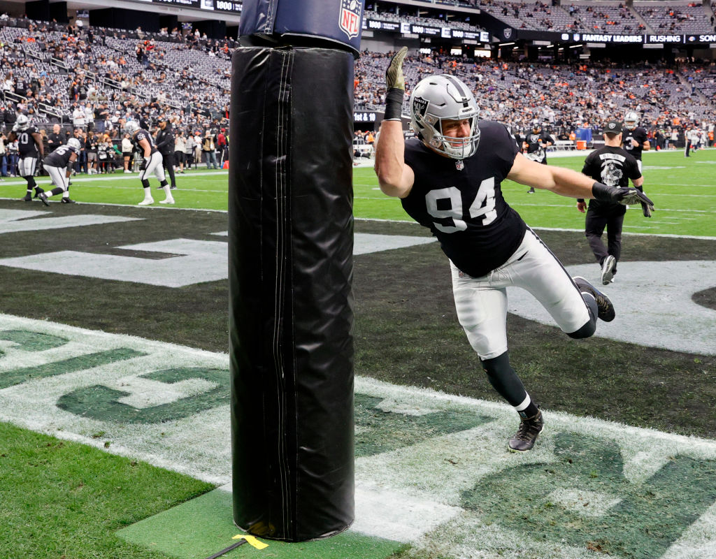 Defensive end Carl Nassib #94 of the Las Vegas Raiders warms up before a game against the Denver Br...