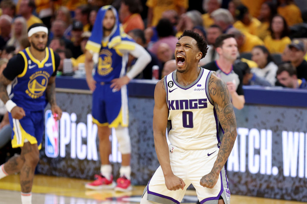 Malik Monk #0 of the Sacramento Kings reacts after making a basket in the second half Game Six of t...