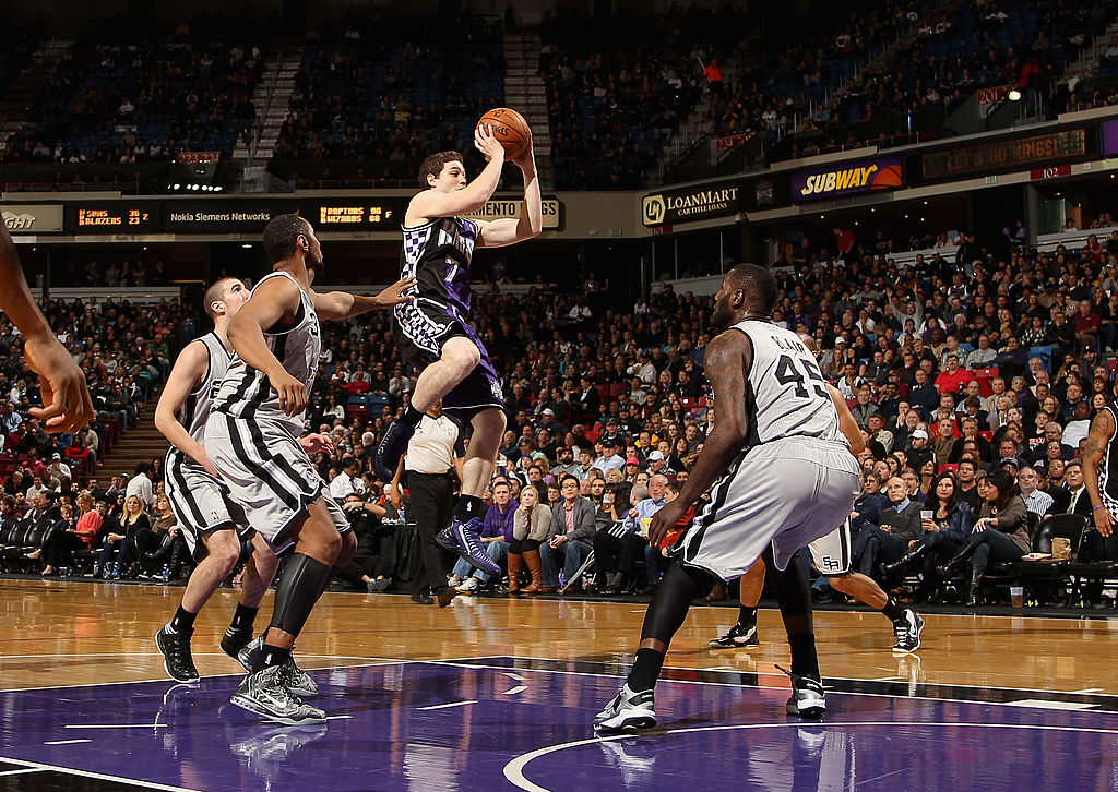 SACRAMENTO, CA - FEBRUARY 19: Jimmer Fredette #7 of the Sacramento Kings goes up for a shot against...