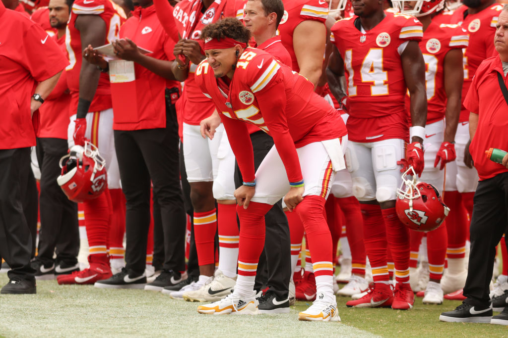 Kansas City Chiefs quarterback Patrick Mahomes (15) looks on from the sidelines in the first half o...