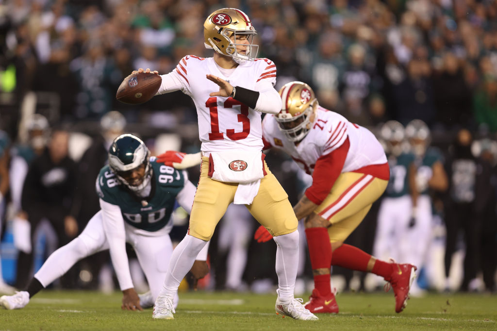 Brock Purdy #13 of the San Francisco 49ers throws a pass during an NFC Championship game against th...