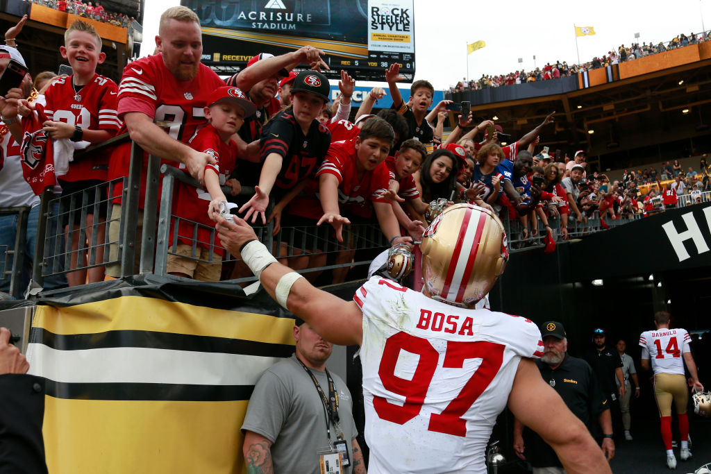 Nick Bosa #97 of the San Francisco 49ers celebrates with fans after the 49ers defeated the Pittsbur...