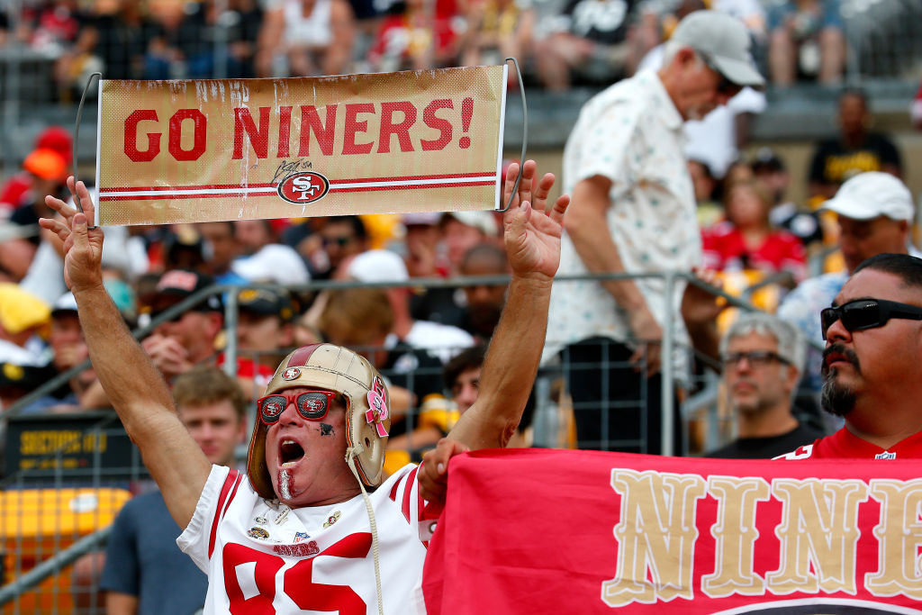 A the San Francisco 49ers fan cheers during a game against the Pittsburgh Steelers at Acrisure Stad...